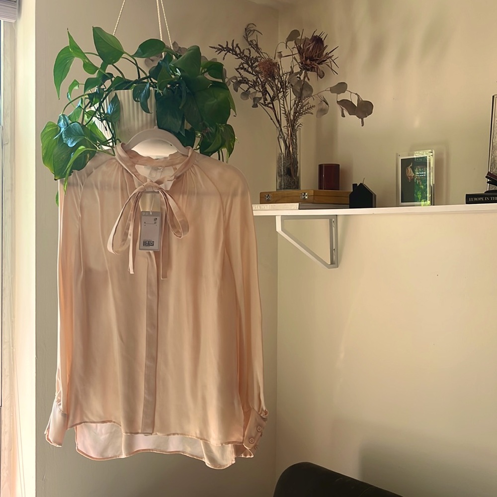 Romantic COS blush blouse with tie detail